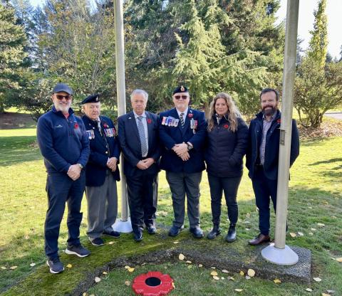Group photo at a Remembrance Day ceremony in Colwood, featuring veterans and city officials.