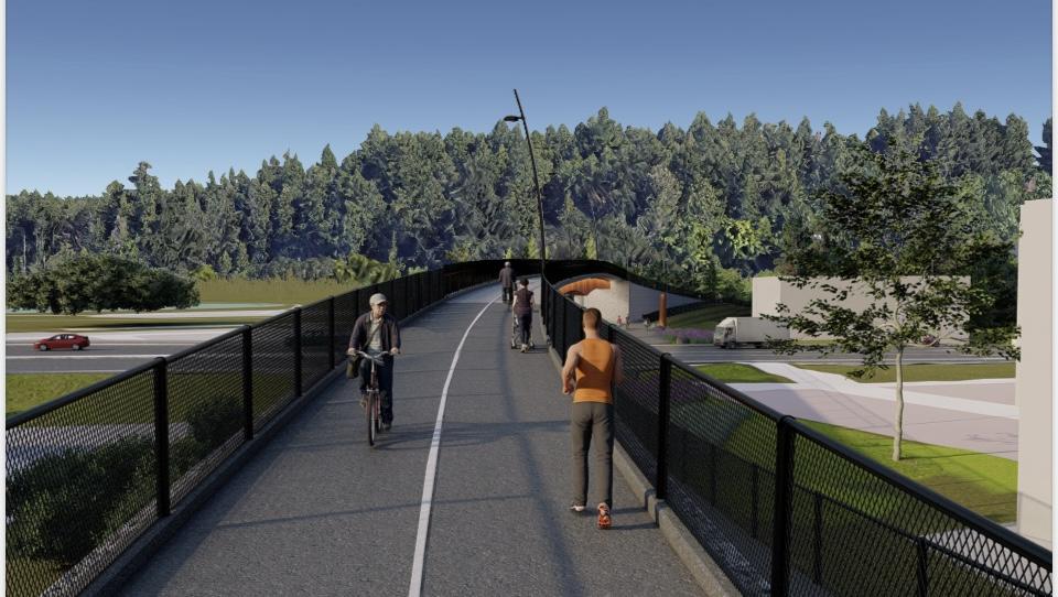 People walking on bridge